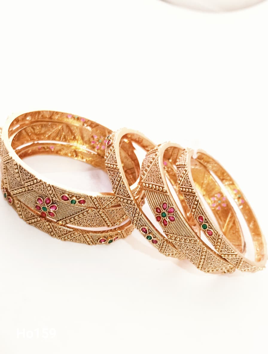 Gold And Gemstone Bracelets