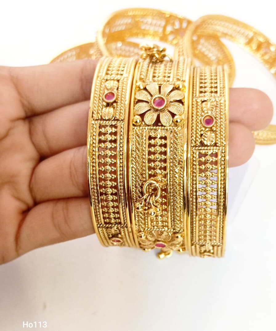 Golden Bracelets With Pink Stones