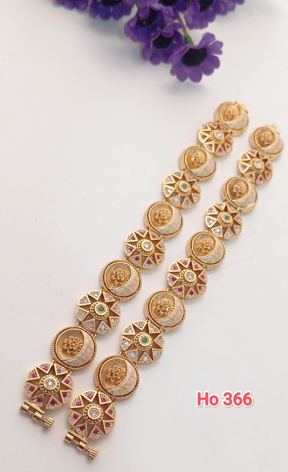 Jewelry Bracelet With Gold Medallions And Pink Gemstones