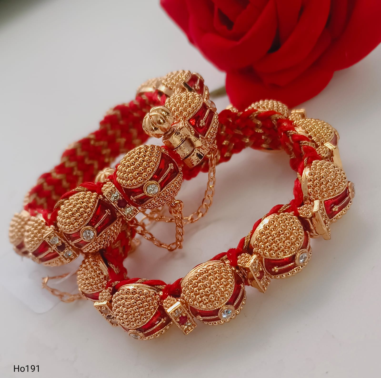 Ornate Red And Gold Bracelets With Intricate Design