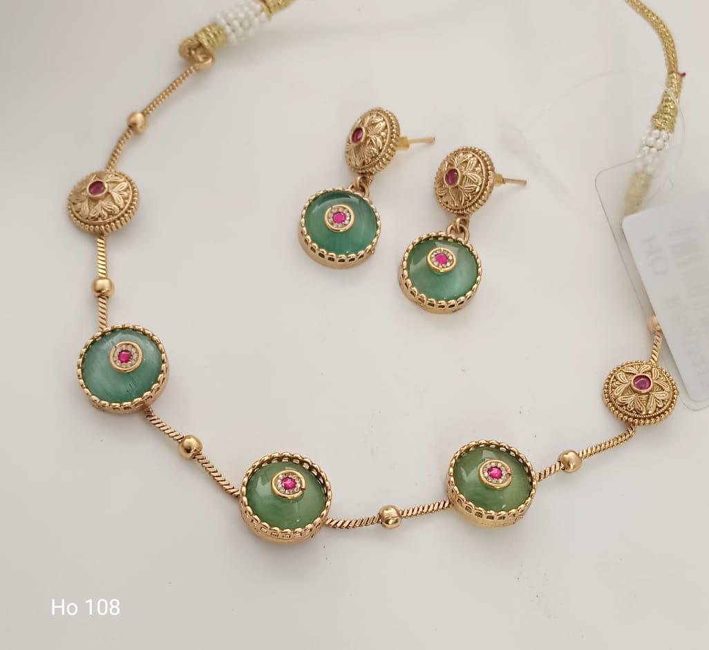 Green And Pink Stone Earrings With Gold Setting