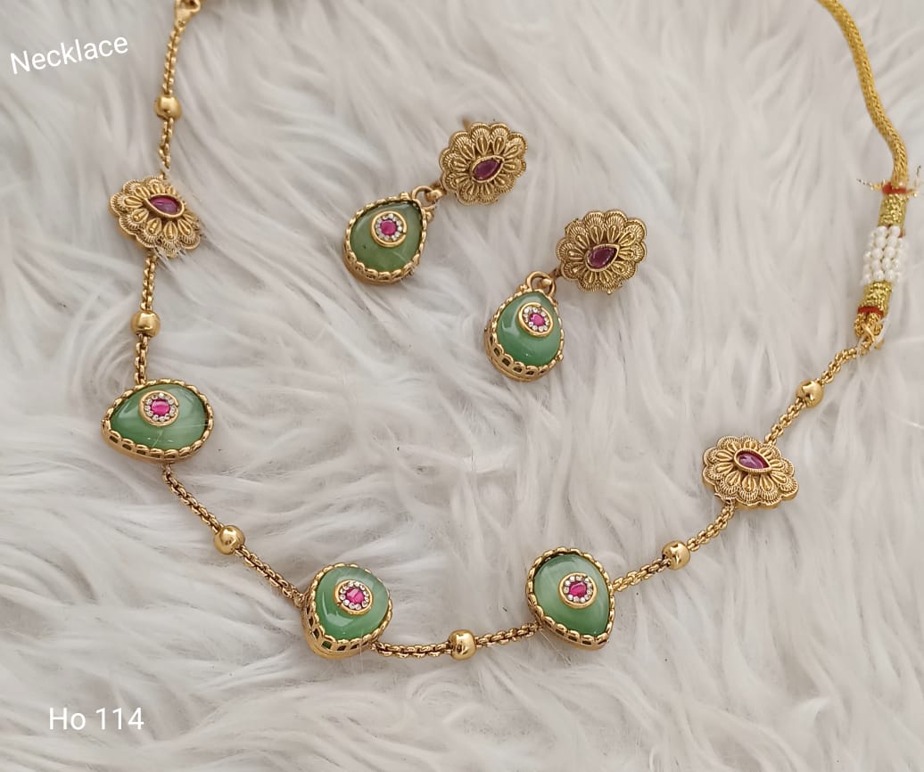 Jade And Ruby Earrings With Gold Accents