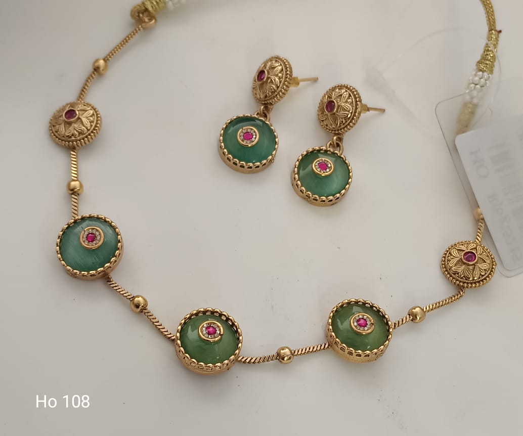 Green And Gold Necklace With Pink Gemstones